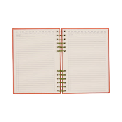 An open, spiral-bound Standard Issue Planner Notebook No. 12 - Army Green + Chili features lined pages with labeled months at the top, delivering a premium writing experience. The left page includes dedicated sections for subject and date, while both pages remain uncluttered, reflecting the notebook’s high-quality construction throughout.