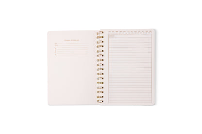 An open Tulip Twin Wire Notebook - Small Blue Lattice displays perforated pages with a blank left side and a lined, hour-marked SCHEDULE section on the right, all shown on a white background.
