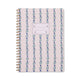 Introducing the Tulip Twin Wire Notebook - Large Wavy Blue: a spiral-bound notebook with a pink cover adorned with vertical blue wavy stripes and a central white label for adding your name or subject. This stylish twin-wire notebook features lined, perforated pages for easy and clean note removal.