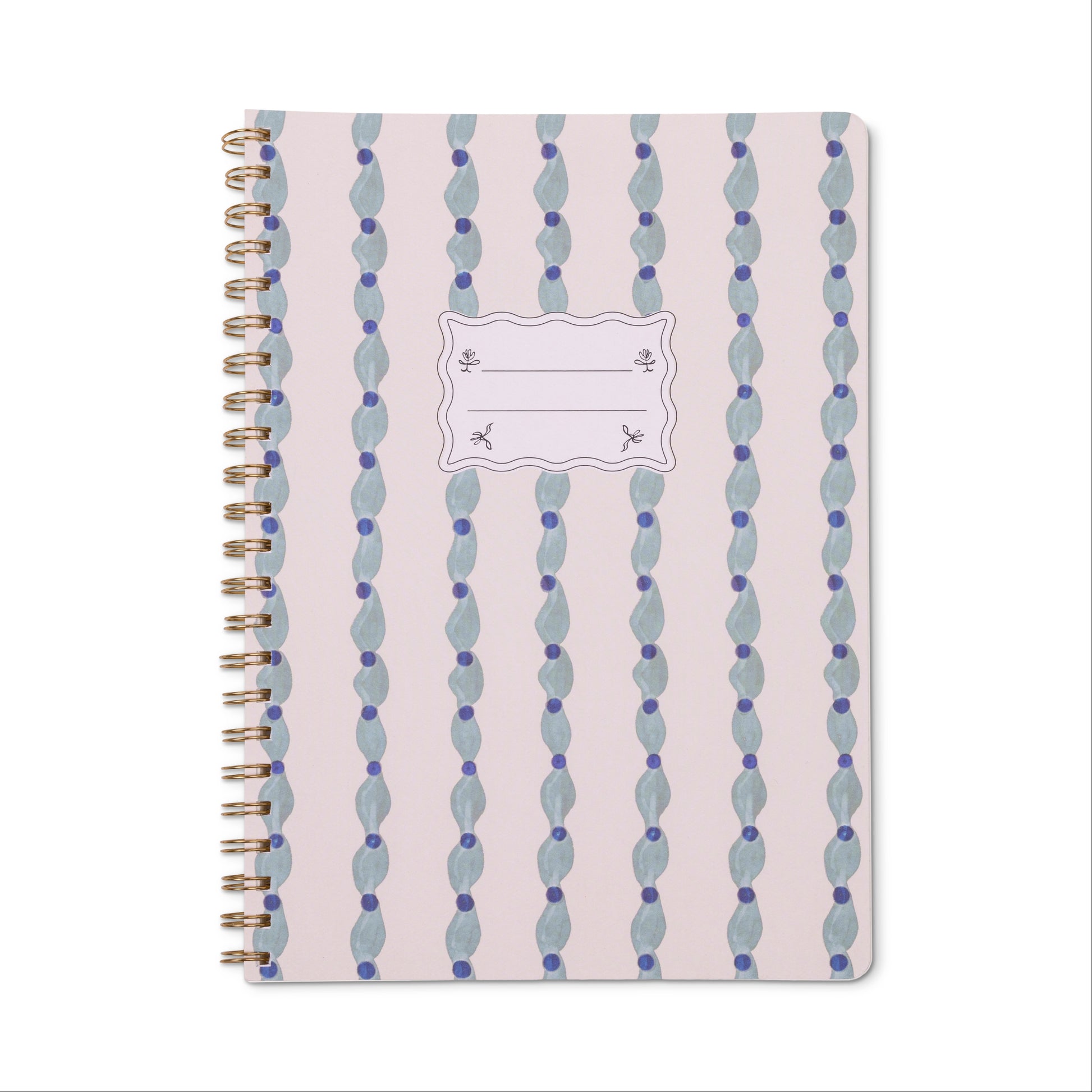 The Tulip Twin Wire Notebook - Large Wavy Blue features a light pink cover with wavy blue, green, and purple dotted patterns, a white name label, lined perforated pages, and sturdy twin-wire binding for convenient note-taking.