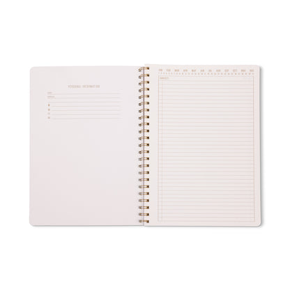 Open Tulip Twin Wire Notebook - Large Wavy Blue displayed against a white background, with a personal information page on the left and a right-hand lined notes page featuring months at the top. This notebook includes lined perforated pages for convenient organization and easy removal.