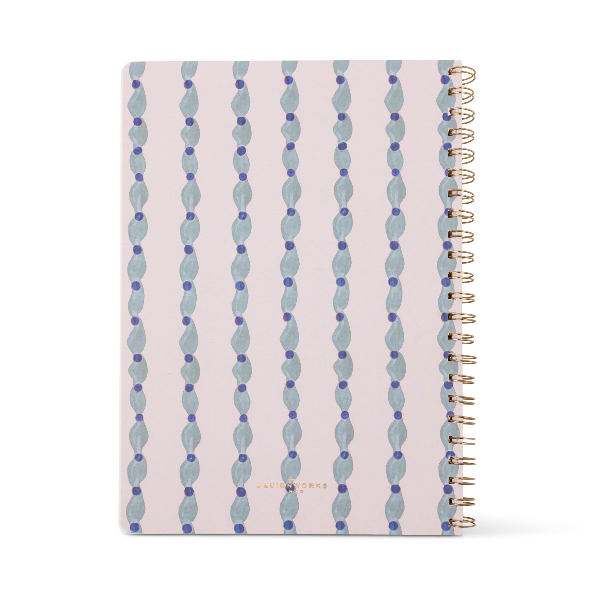 The Tulip Twin Wire Notebook - Large Wavy Blue is spiral-bound with a pale pink cover featuring blue and lavender wavy shapes, lined perforated pages, and "DESIGNWORKS" printed in gold at the bottom center.