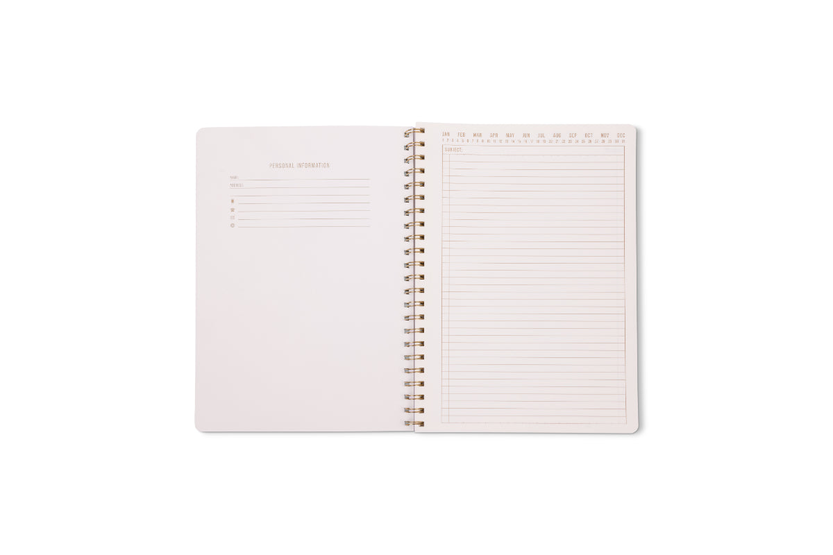 The Tulip Twin Wire Notebook - Large Wavy Blue is open, showing a left page with Personal Information sections and a right lined, perforated page with numbered columns to help organize your notes.