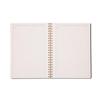 Sure! Here’s a rewritten version of the sentence using your product data: The Tulip Twin Wire Notebook - Large Orange Check features an open spiral binding and lined, perforated pages with headers for Subject, as well as columns for days and dates across the top. Its pages are blank and ready for writing.