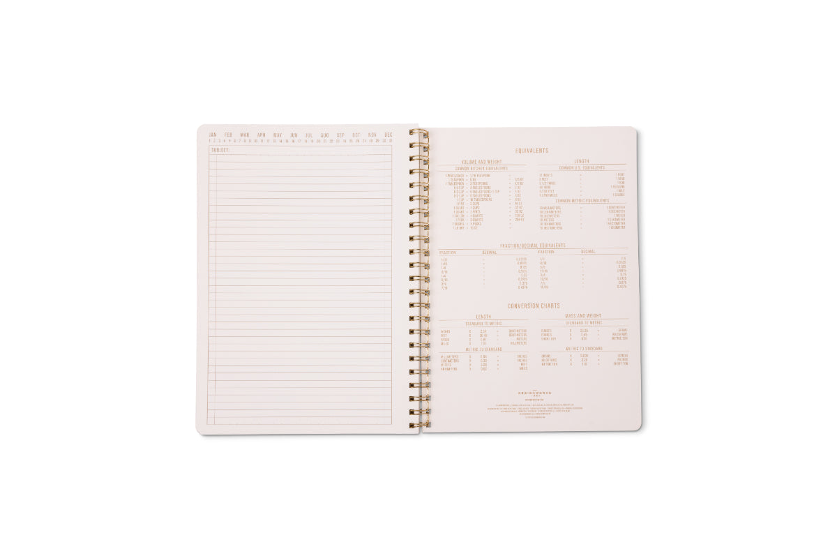A Tulip Large Twin Wire Notebook - Orange Check lies open on a white background, showing lined perforated pages on the left and reference charts with measurements and conversions on the right.