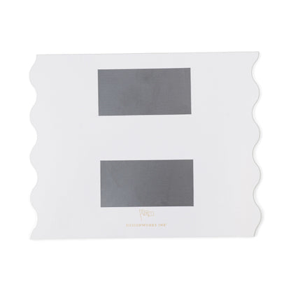 The Meal Planner Notepad with Magnets – Cloud + Cream features a white rectangular frame with scalloped edges, two black sections for lists or menus, and is labeled DesignWorks Inc.—a stylish choice for organizing your week.