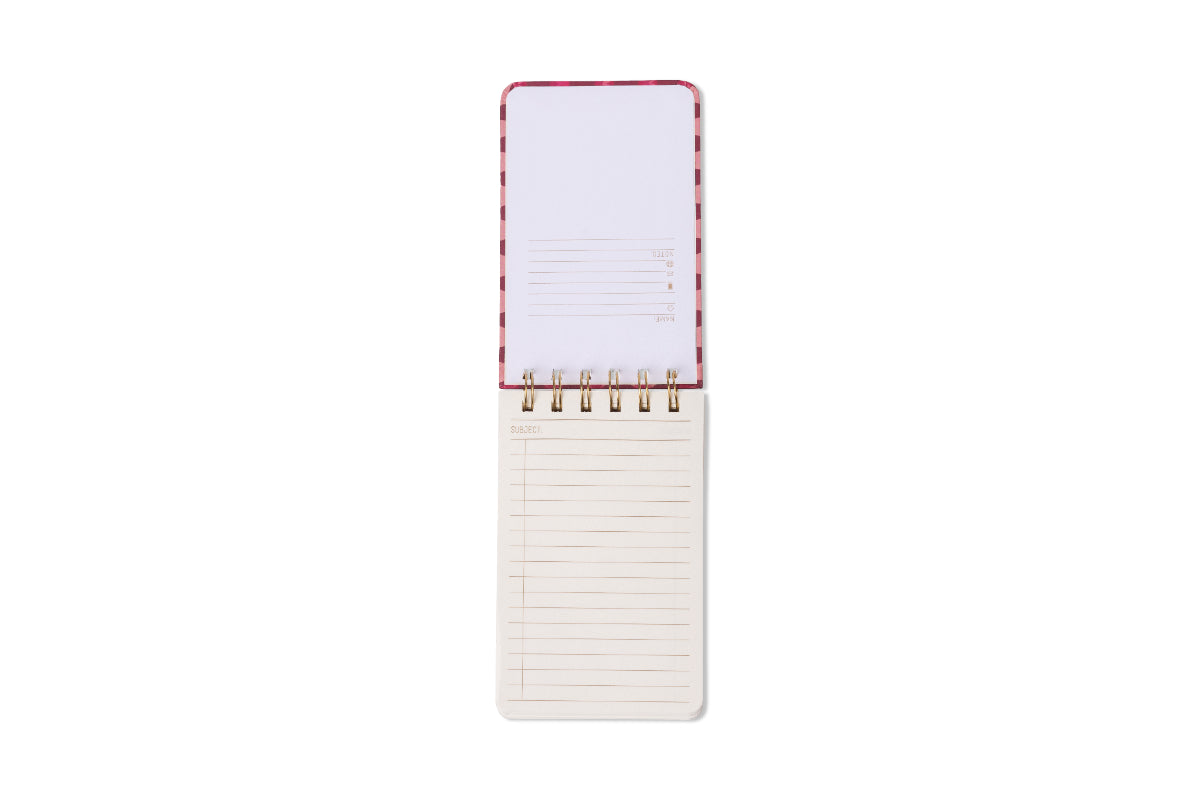 The Tulip Twin Wire Notepad - Pinwheel Pink is open, showing lined pages. The top sheet has spaces for date, number, and subject, while the bottom sheet is simply ruled. All set against a white background.