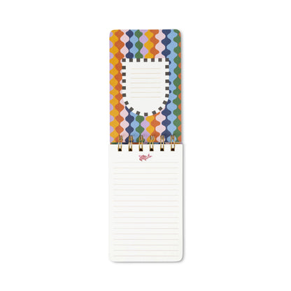 The A Dopo Fish Twin Wire Notepad features an open spiral design, a vibrant wavy-patterned cover, and lined, acid-free pages for writing. This eco-friendly stationery item is shown against a white background.