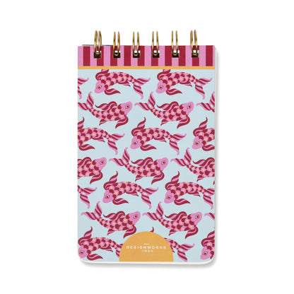 The A Dopo Fish Twin Wire Notepad is a compact notepad with a cover showcasing a repeating pattern of pink and red koi fish set against a light blue background. It features gold twin wire binding at the top and contains acid-free paper, making it ideal for jotting down notes or sketches while ensuring your work is preserved.