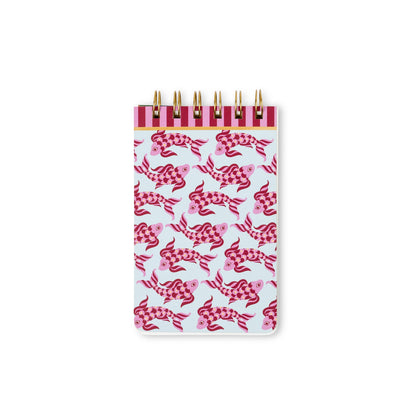 The A Dopo Fish Twin Wire Notepad is a compact notepad adorned with a pink and red koi fish pattern on a white background, crafted from acid-free paper for durable notes and an enhanced eco-friendly stationery experience.