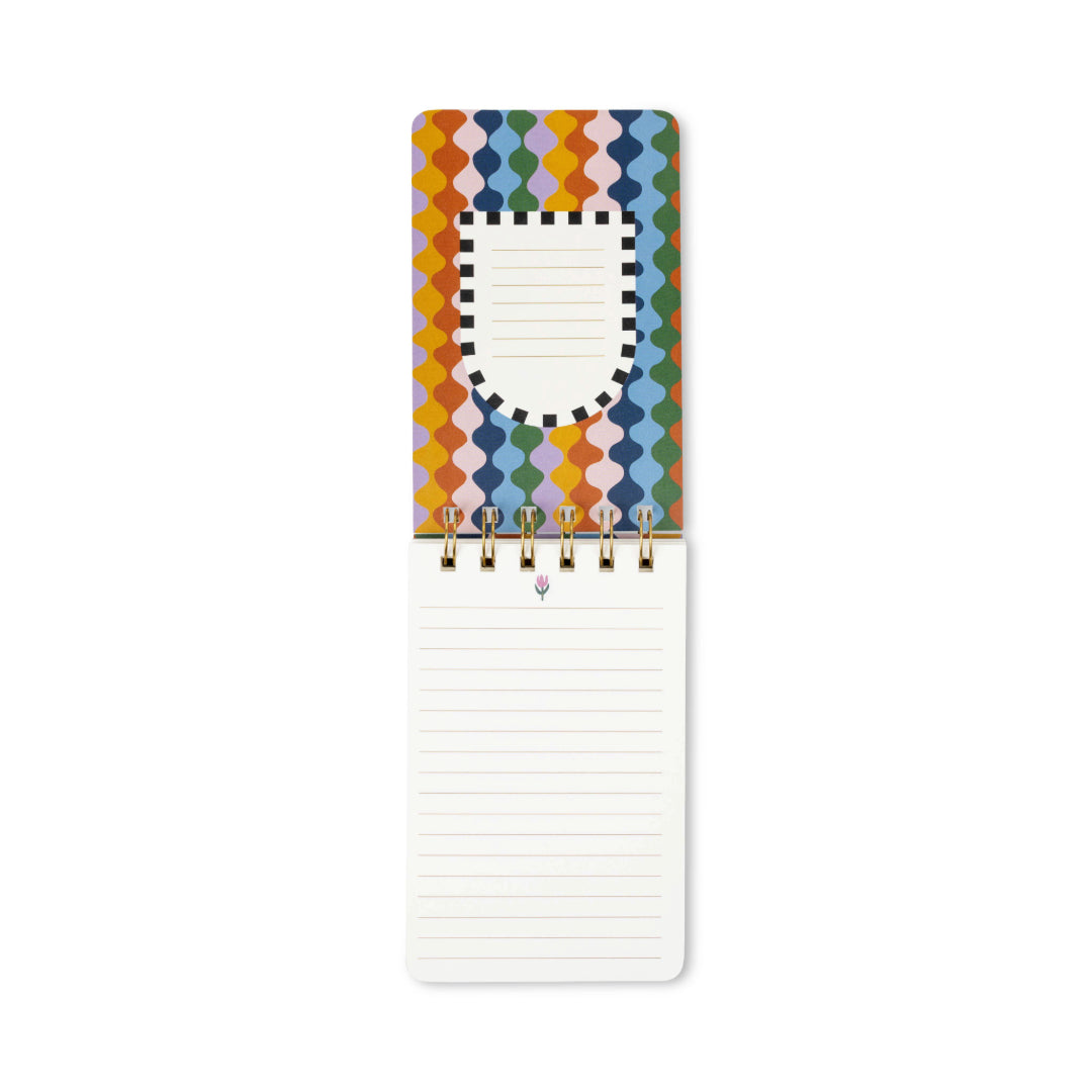 Introducing the A Dopo Blue Cheetah Twin Wire Notepad: an open spiral compact notepad featuring vibrant blue cheetah patterns on the cover and lined, acid-free paper pages inside. The top section includes a small notes area bordered with a chic black-and-white checkered design—ideal for anyone who loves eco-friendly stationery.