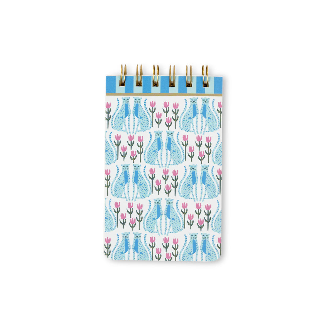 Introducing the A Dopo Blue Cheetah Twin Wire Notepad—a small, eco-friendly stationery notepad with a sturdy spiral binding and a charming cover design featuring blue cheetahs and pink florals against a crisp white background. Compact and convenient for jotting down notes on the go, this notepad contains acid-free paper to keep your writing preserved over time.