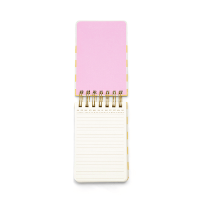 Open chunky notepad on a white background. 