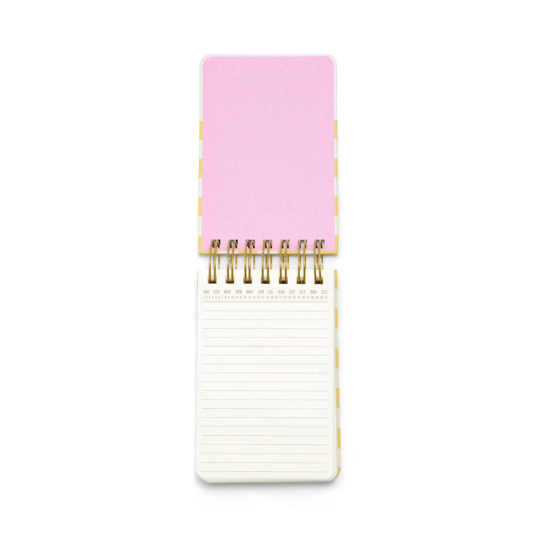 A Chunky Small Twin Wire Notepad - Checks, featuring an open spiral design with a pink blank top page and a lined white bottom page, viewed from above on a white background.