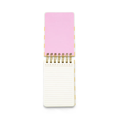 A Chunky Small Twin Wire Notepad - Checks, featuring an open spiral design with a pink blank top page and a lined white bottom page, viewed from above on a white background.