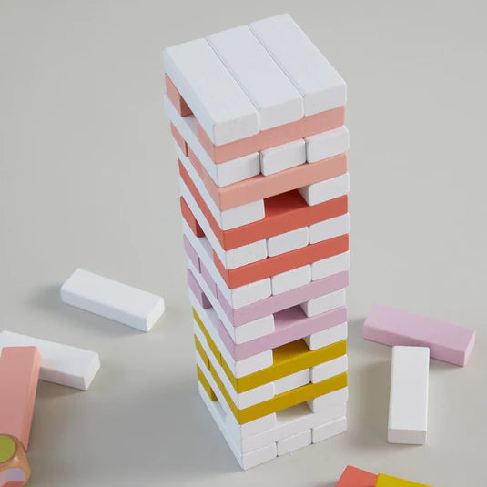 Tumbling Blocks game on pink background