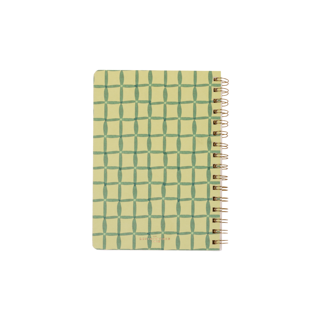 The Tulip Twin Wire Notebook - Small Green Lattice displays a green geometric grid on a light yellow cover, spiral-bound and shown centered on a white background.