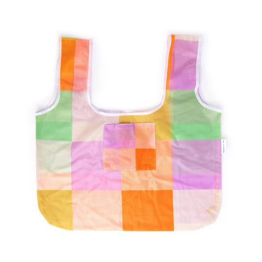 Reusable market bag with two handles, checked pattern and side pocket on white background