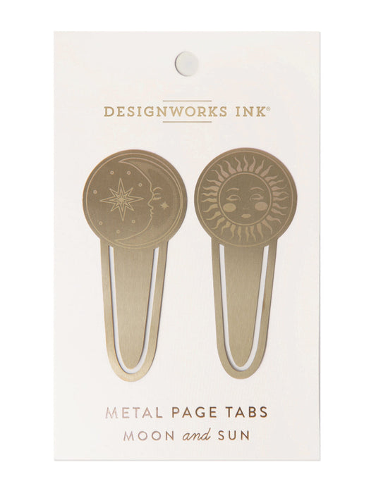 set of two gold colored metal page tabs, one with celestial moon design and one with celestial sun design