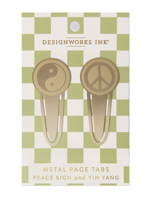 set of two gold colored metal page tabs; one peace sign design and one yin yang design