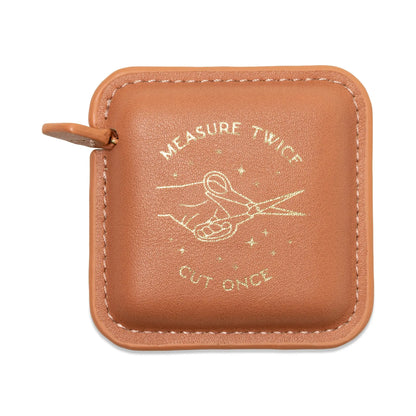 Pocket Tape Measure - Measure Twice pink case with hand and scissors embossed