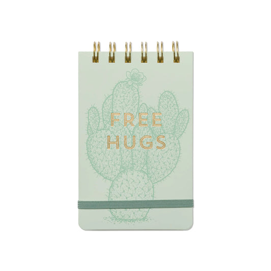 The Vintage Sass Notepad - Free Hugs features a charming FREE HUGS cactus design on the cover and a convenient elastic band—perfect for adding personality to your stationery collection.